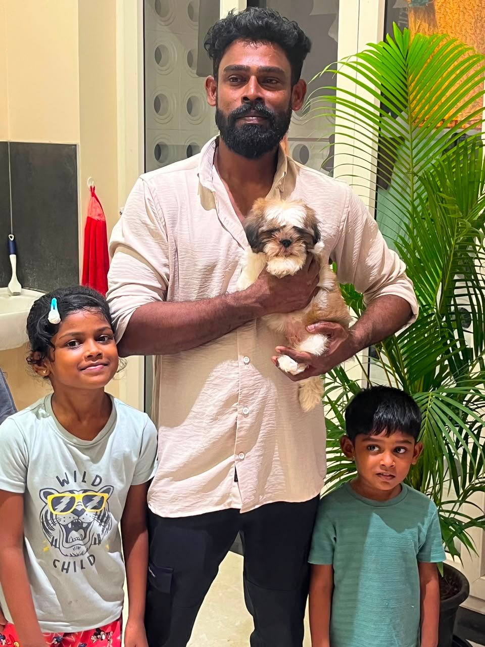 happy customer with shih tzu puppy from Kumaran Pet House Chennai