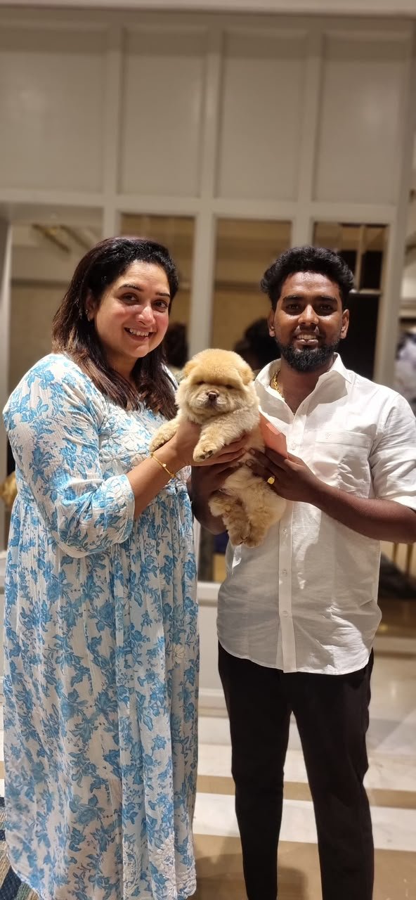 happy customer with golden retriever puppy from Kumaran Pet House Chennai